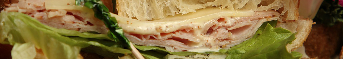 Eating Sandwich at Green Line Cafe restaurant in Philadelphia, PA.